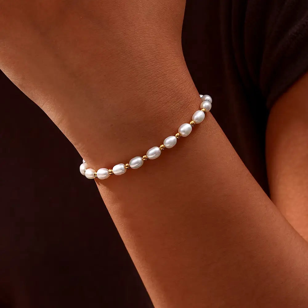 Elegante armband met parels in goud