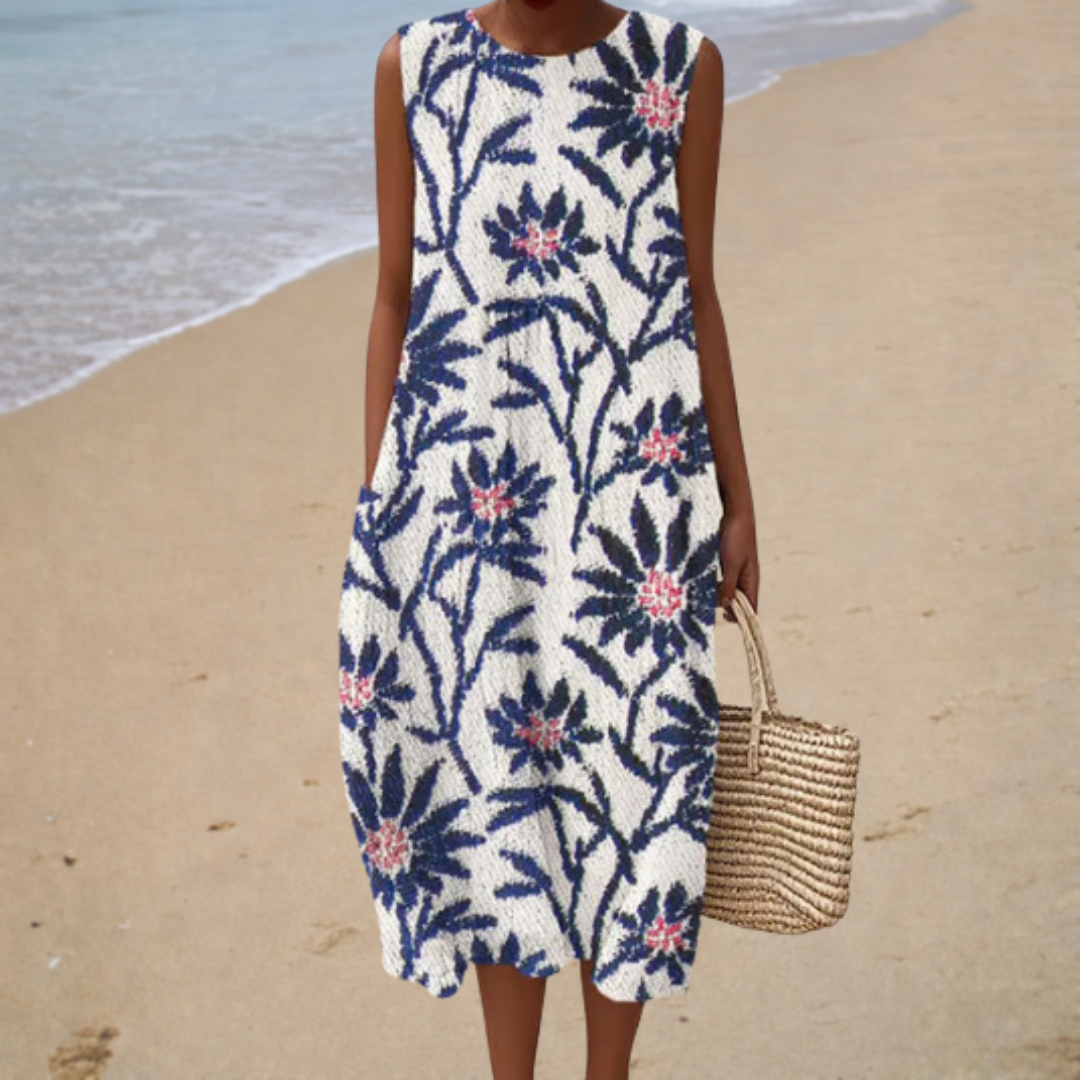 Petronella mouwloze jurk met blauwe bloemen