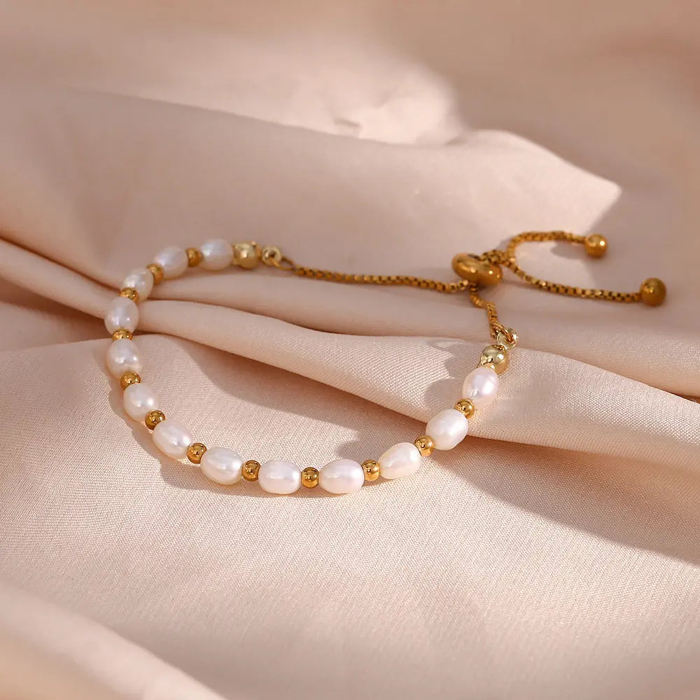 Elegante armband met parels in goud