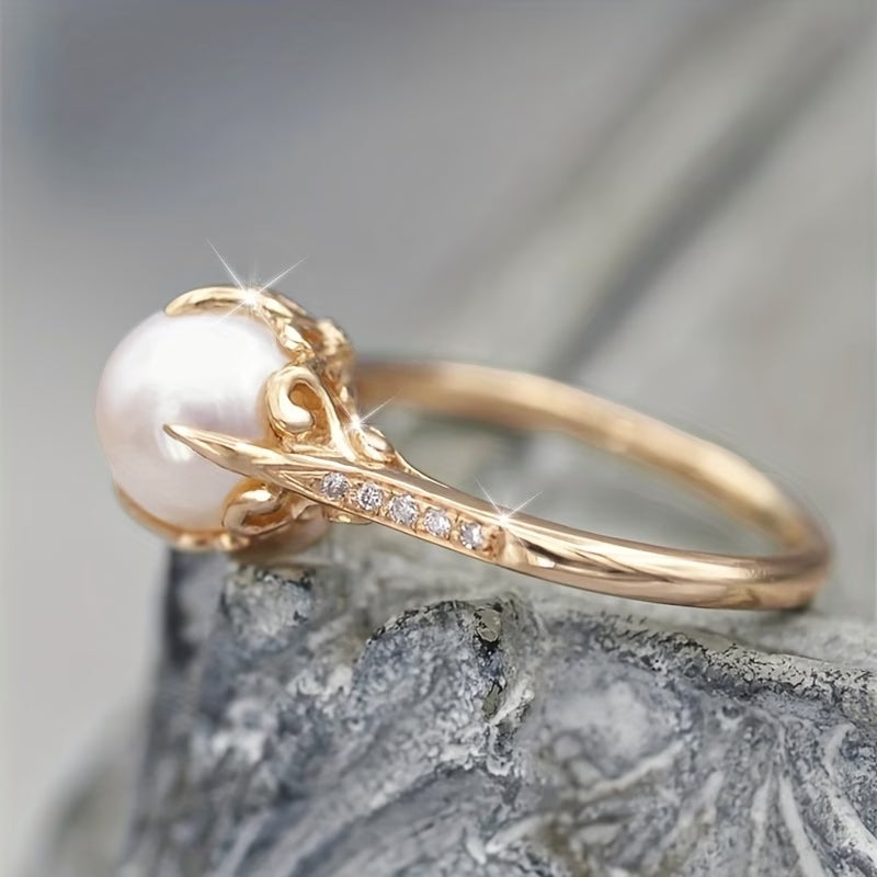 Fijne ring met parels en kristallen