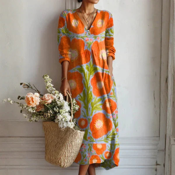 Alicia | Lange jurk met bloemen bij zonsondergang