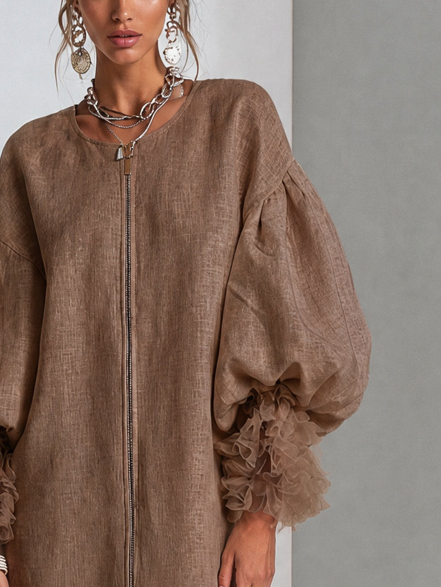 Bruine mini-jurk met rits en pofmouwen