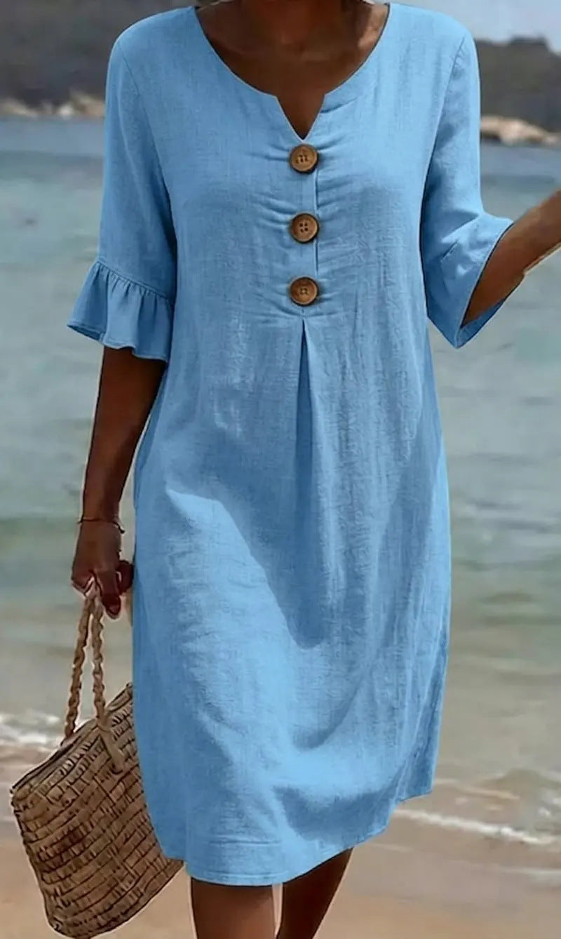 Hilde | Blauwe strandjurk met houten knopen