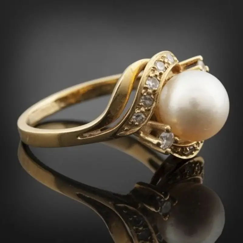 Elegante ring met parel in glanzend goud