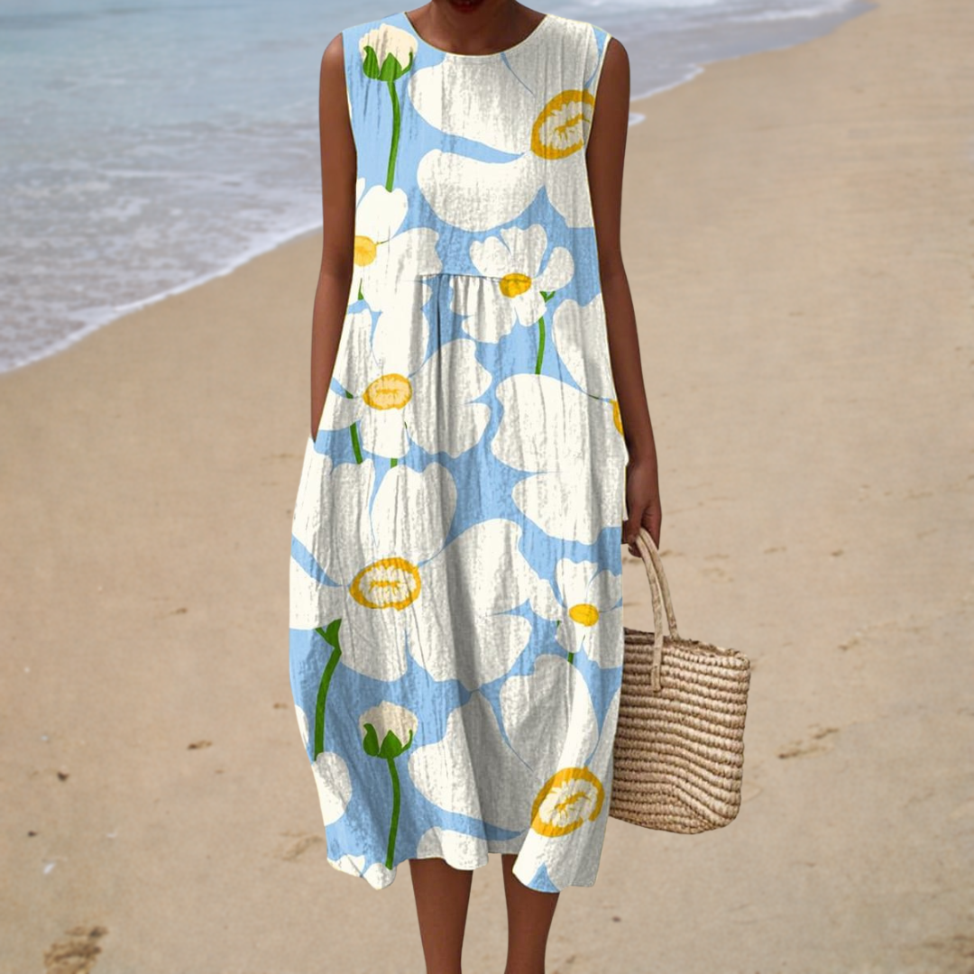 Jetty mouwloze jurk met bloemen op lichtblauw