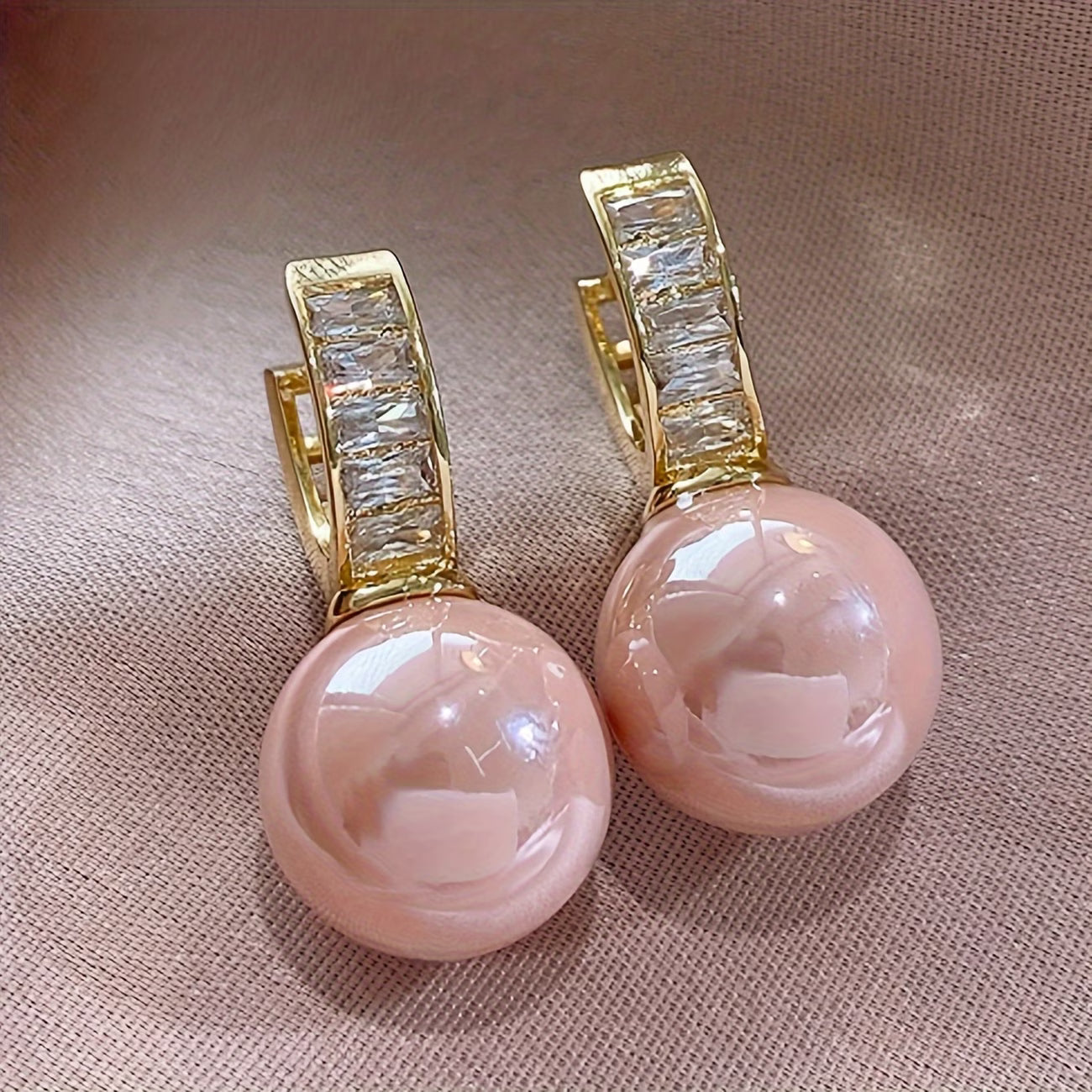 Oorbellen met roze parel