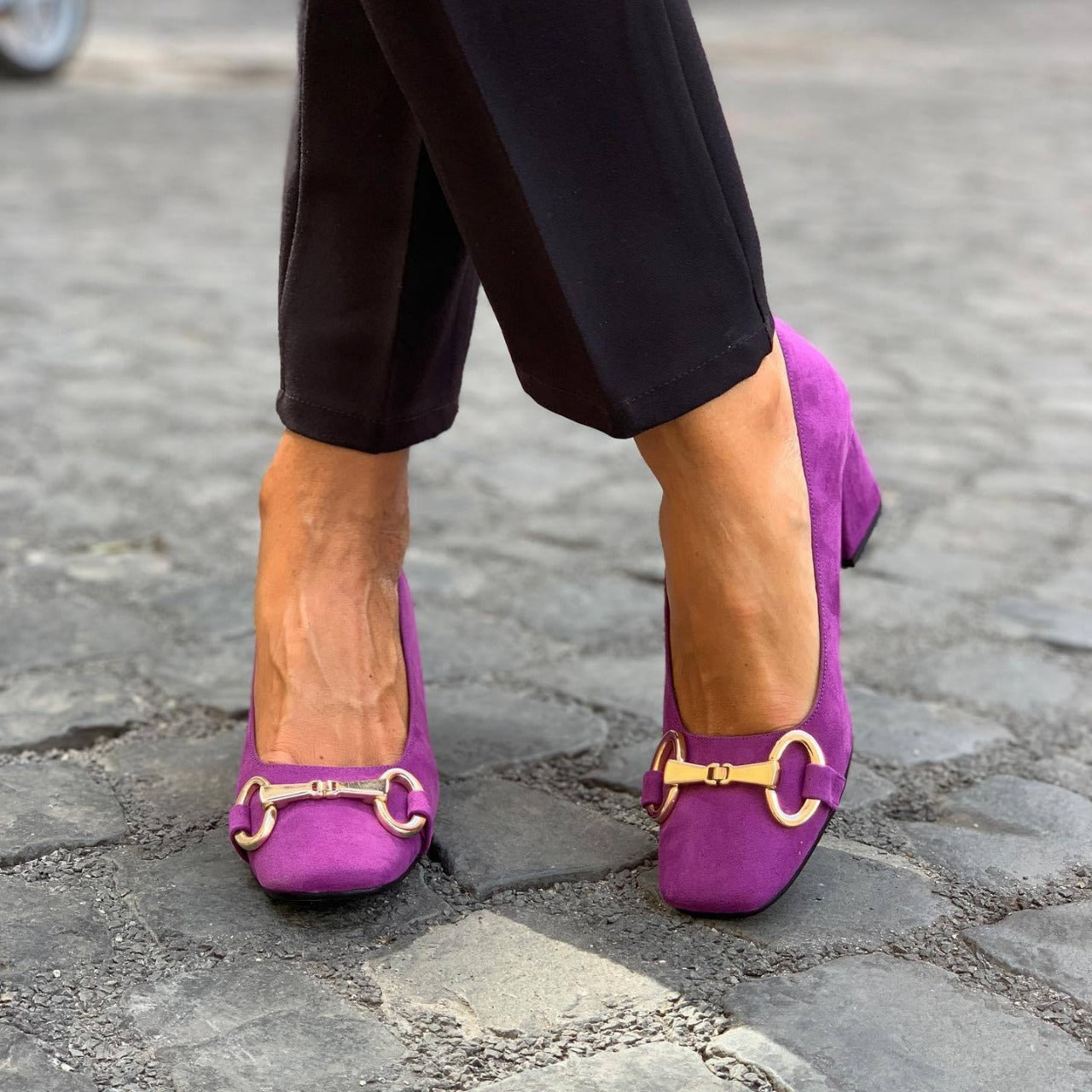 Elegante pumps met gouden detail