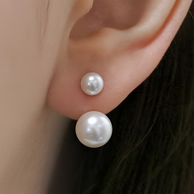 Statement oorbellen met dubbele parel