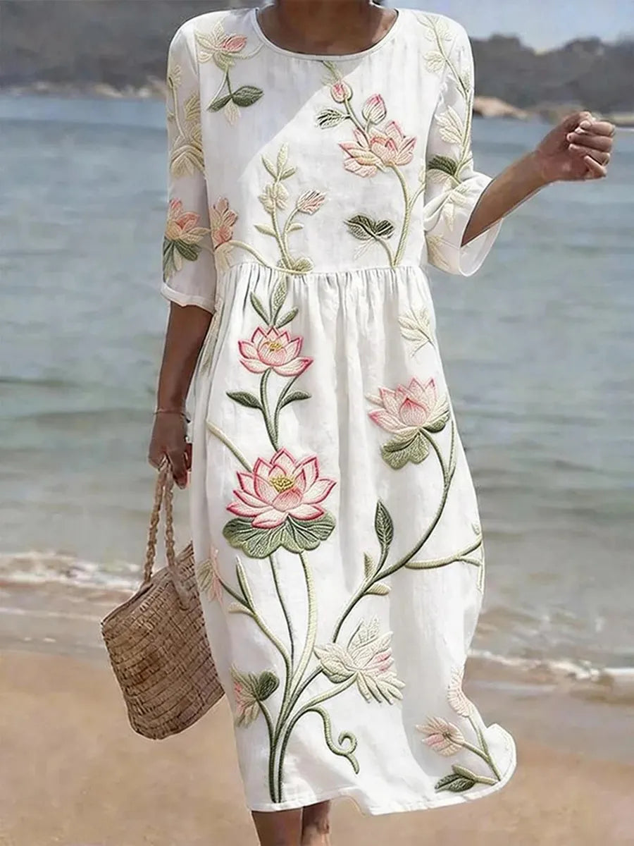 Hanne | Witte strandjurk met roze lotusborduring