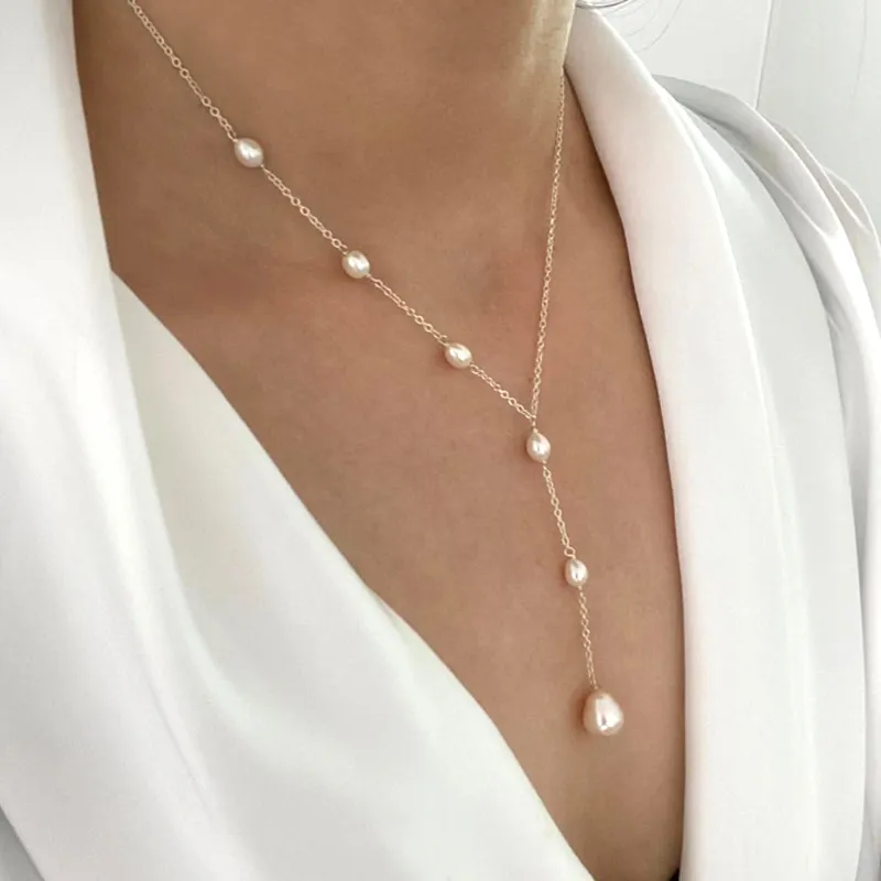 Lariat ketting met cascade van parels